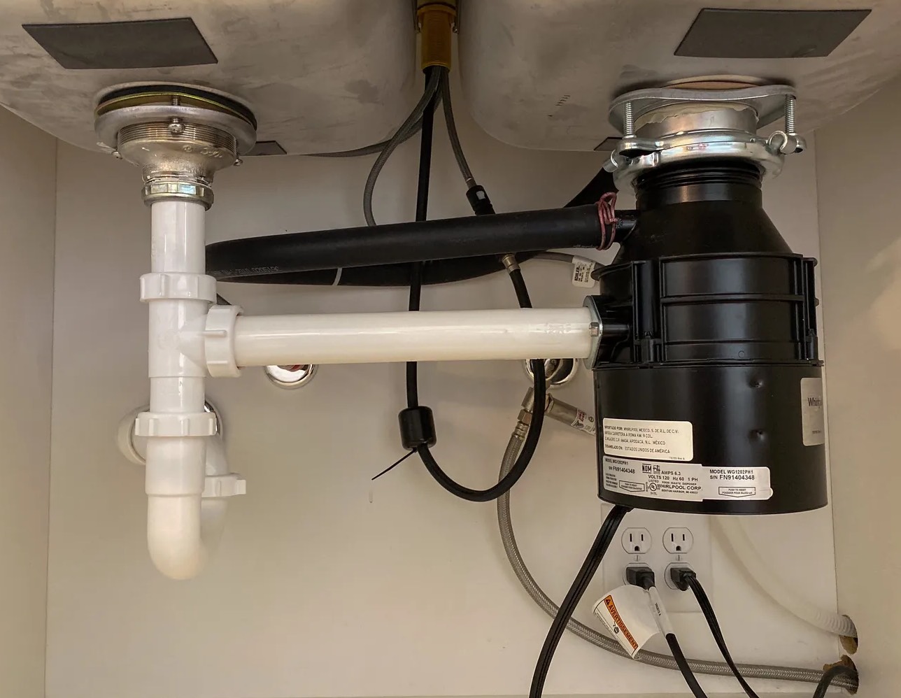 Leaky Garbage Disposal Cleanup in DeSoto, TX